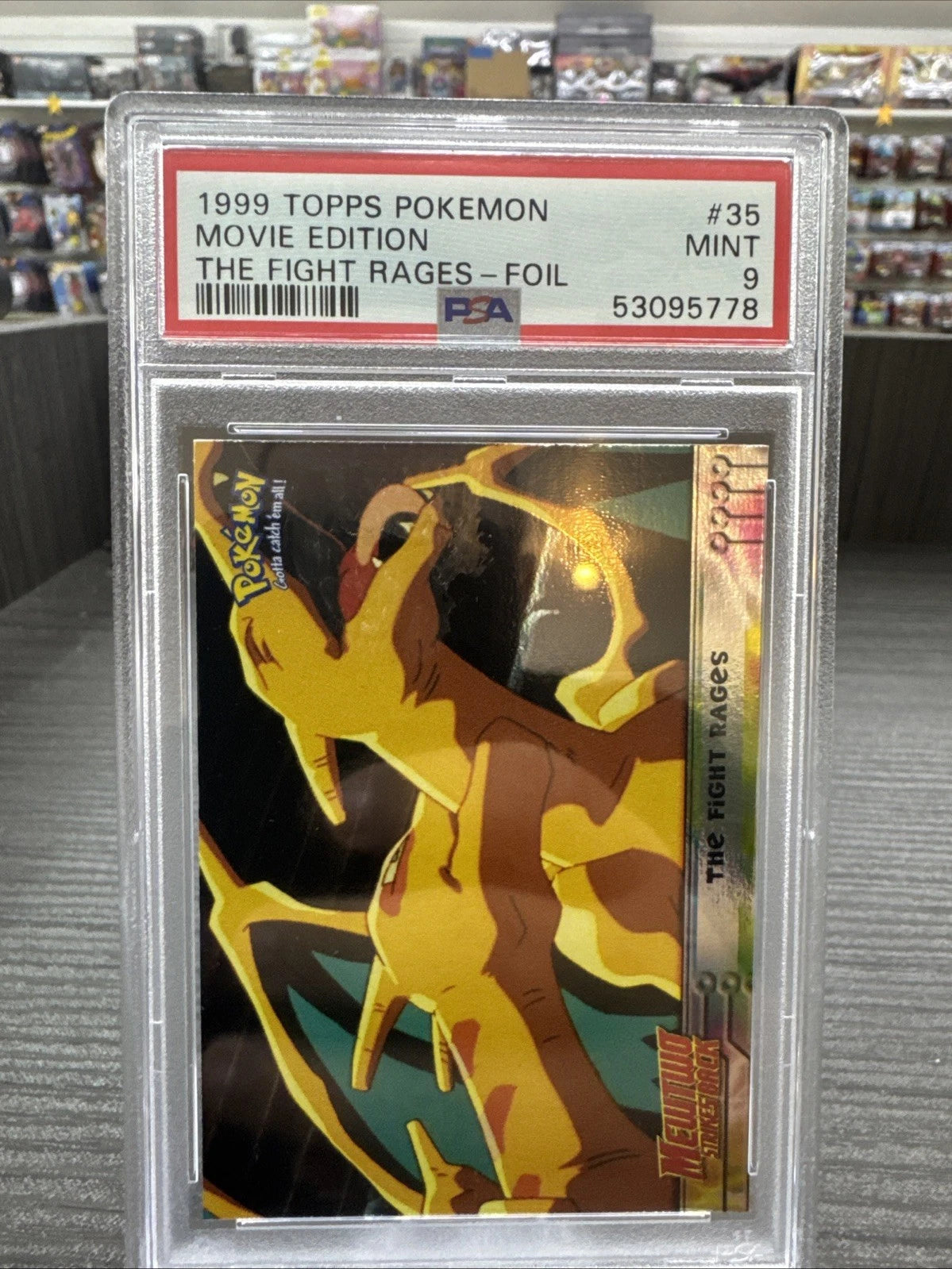 1999 TOPPS POKEMON THE MOVIE EDT THE FIGHT RAGES-FOIL #35 MOVIE EDITION PSA 9